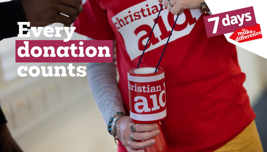 A volunteer wearing a Christian Aid uniform and holding Christian Aid donation bucket. the copy reads 'Every donation counts'.