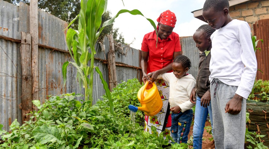 Belinda with her children in garden