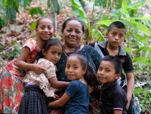 Woman hugging her family