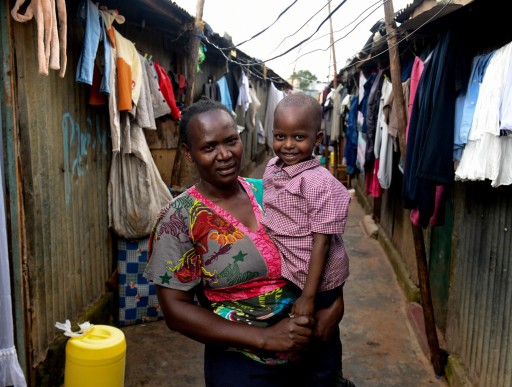 Fridah and her Grandson Quillan outside their home in Dagoretti, Nairobi, Kenya