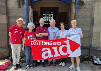 Christian Aid supporters outside church book sale