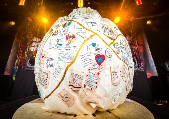 Christian Aid giant Restoration pot on stage at Greenbelt Festival 2025