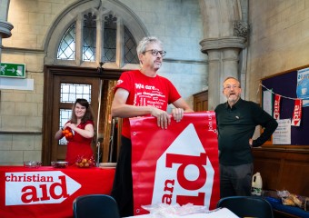 Volunteers setting up at Christian Aid Week event